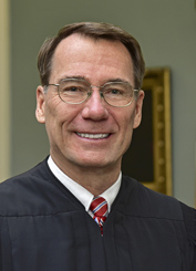 Associate Justice James P. Bassett
